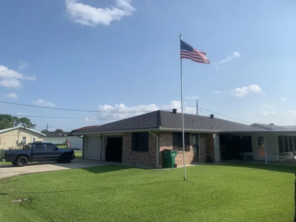 Metal shingle roof with traditional curb appeal